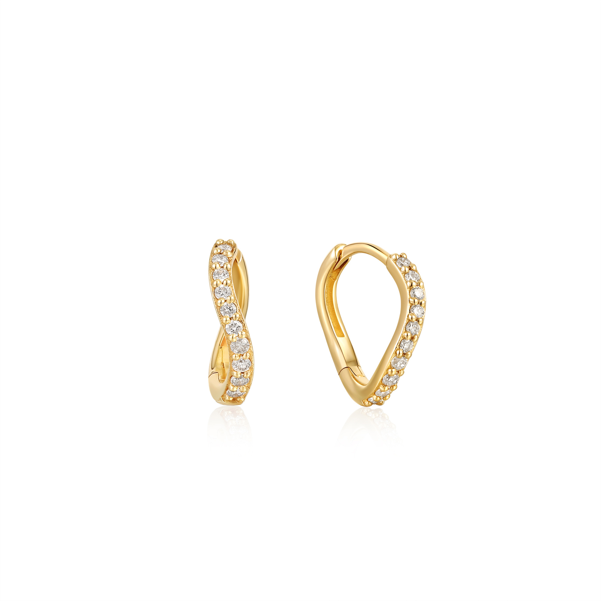 De magma diamond huggie hoop earrings zijn een unieke kijk op een klassiek paar oorringen. Deze oorringen van 14kt goud zijn het perfecte stuk om dit seizoen alleen te dragen of in combinatie met meerdere oorbellen voor een echte earparty.