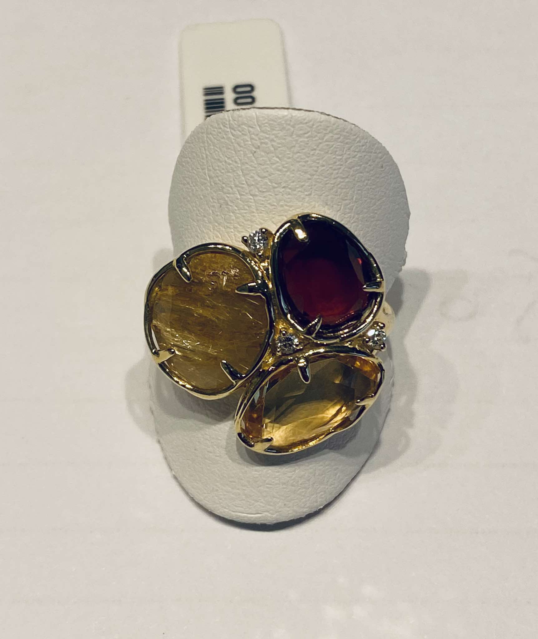 Ring in goud 18 k met with garnrt , citrine ,rut qartz en diam 0.08 ct