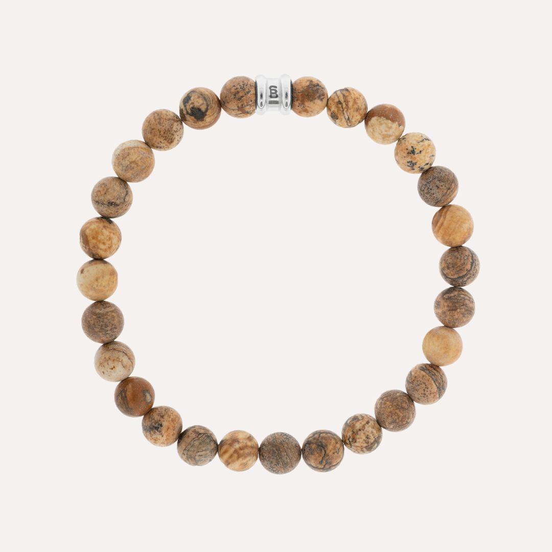De Steel&Barnett Heren Armband Wood Stones SBB/014 is een stijlvolle herenarmband gemaakt van bruin hout, verkrijgbaar in small, medium en large.  Perfect te combineren met een casual outfit voor een eigentijdse look. Draag het solo of mix met andere armbanden voor een gelaagde stijl.