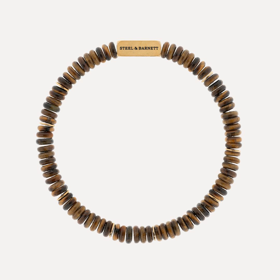 De Steel&Barnett Two Tone Tiger Heren Armband is een stijlvolle heren armband met bruin en gouden accenten. Verkrijgbaar in small, medium en large. Draag deze armband solo of combineer met andere armbanden voor een trendy look. Perfect voor zowel casual als formele gelegenheden.