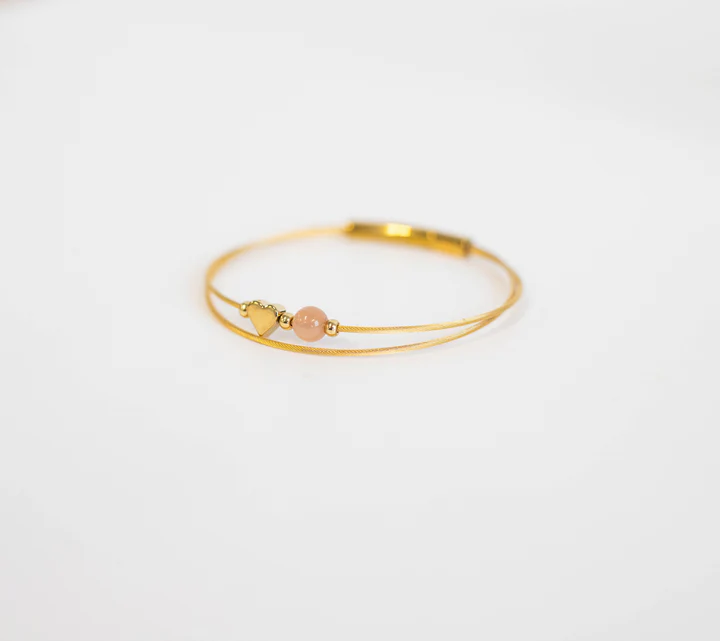 Lief armbandje met zonnesteen en hartje in edelstaal