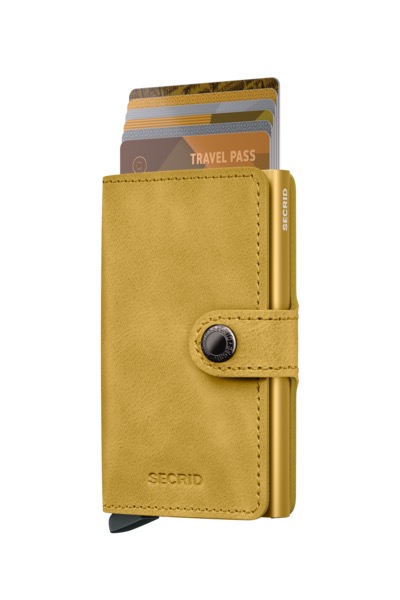 Miniwallet Vintage Yellow is gecorrigeerd leer, gemaakt in Nederland van Europese runderhuiden. 

Draagt
4 verdikte of 6 platte kaarten
4 extra kaarten
Bankbiljetten
Visitekaartjes
Bonnetjes
Afmetingen en gewicht
65 x 102 x 21 mm
72 g