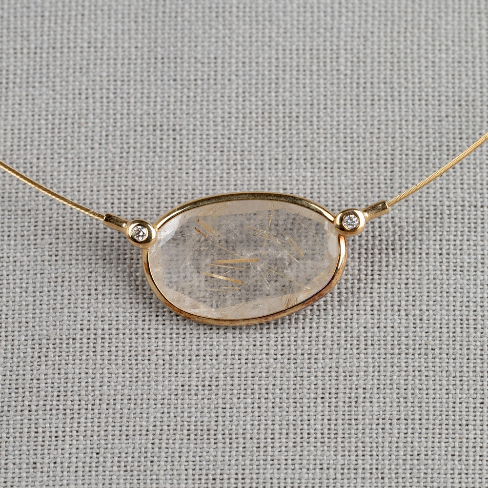 Collier gemaakt van 14 karaat goud in combinatie met de edelsteen Gold Rutiel en Diamant. Combineer met de andere gouden sieraden van Jeh Jewels.