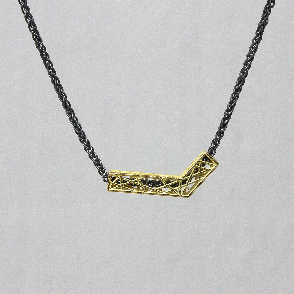 Collier gemaakt van 925 geoxideerd sterling zilver met daaraan een 3D hanger in 14 karaat goud. *Prijswijzigingen voorbehouden in verband met goudkoers en gewicht!