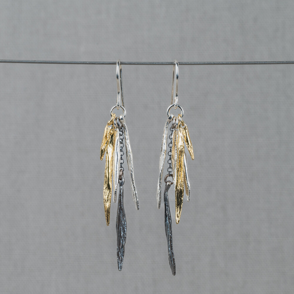 Oorhangers met sprieten gemaakt van 925 sterling zilver, geoxideerd zilver en zilver verguld. Combineer deze oorbellen met een mooi collier, een ring en armband voor een complete look!