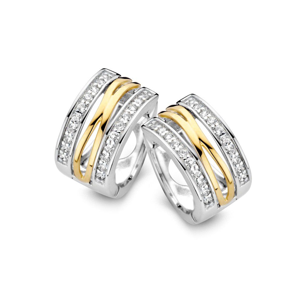 Deze oorringen zijn gemaakt van gerhodineerd zilver met 14 karaat goud (geen oplaag). Verder zijn ze voorzien van zirkonia.

U kunt een set maken met de bijpassende ring en collier met hanger!