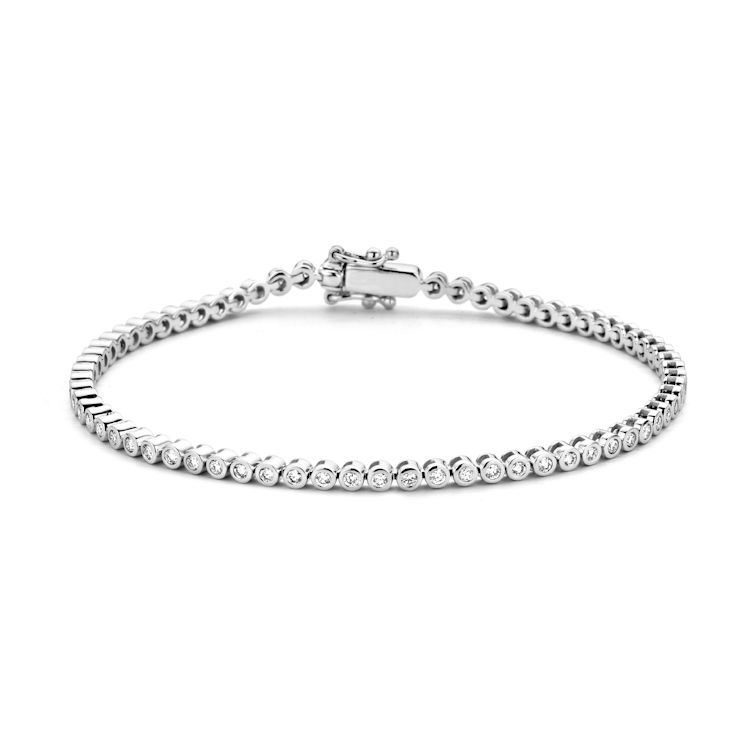 Witgouden tennisarmband met briljant in ronde zetkast, 69 briljanten, 1.00 crt. totaal.
