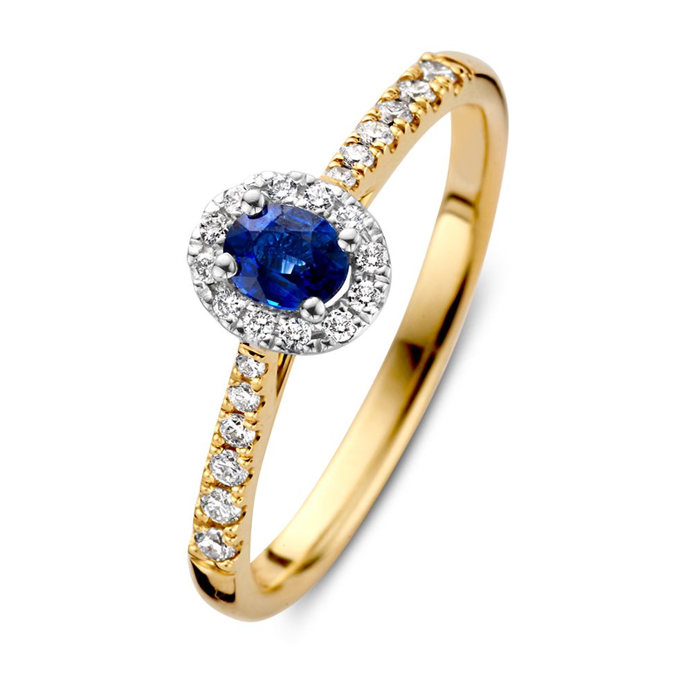 Bicolor wit- en geelgouden damesring met een ovale saffier als schitterende middensteen. De ring is voorzien van een diamanten halo en extra diamanten in de band van de ring. Dankzij de verhoogde zetting kan hij perfect gecombineerd worden met andere gouden ringen.
