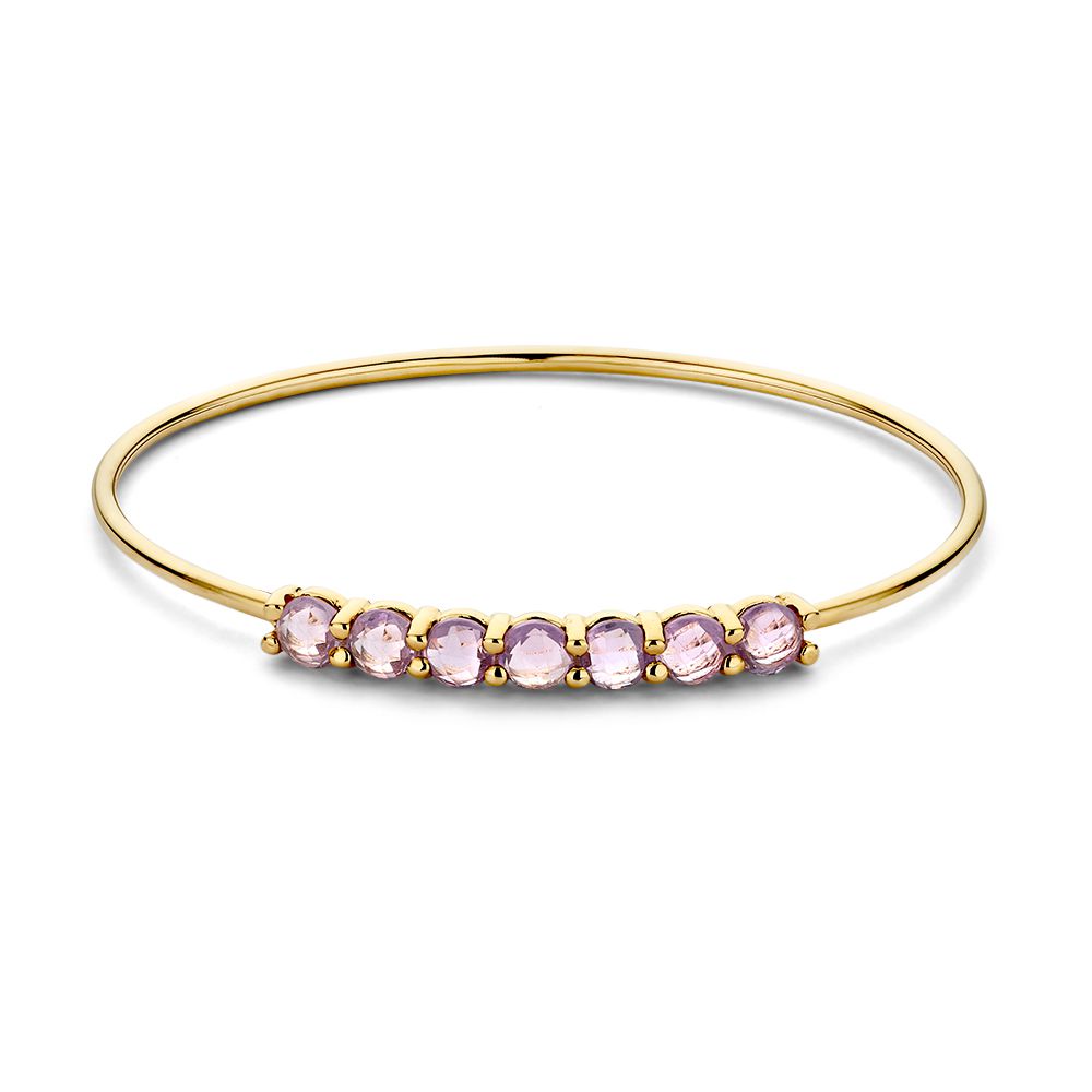 Gouden bangle gezet met 7 gefacetteerde amethisten.
