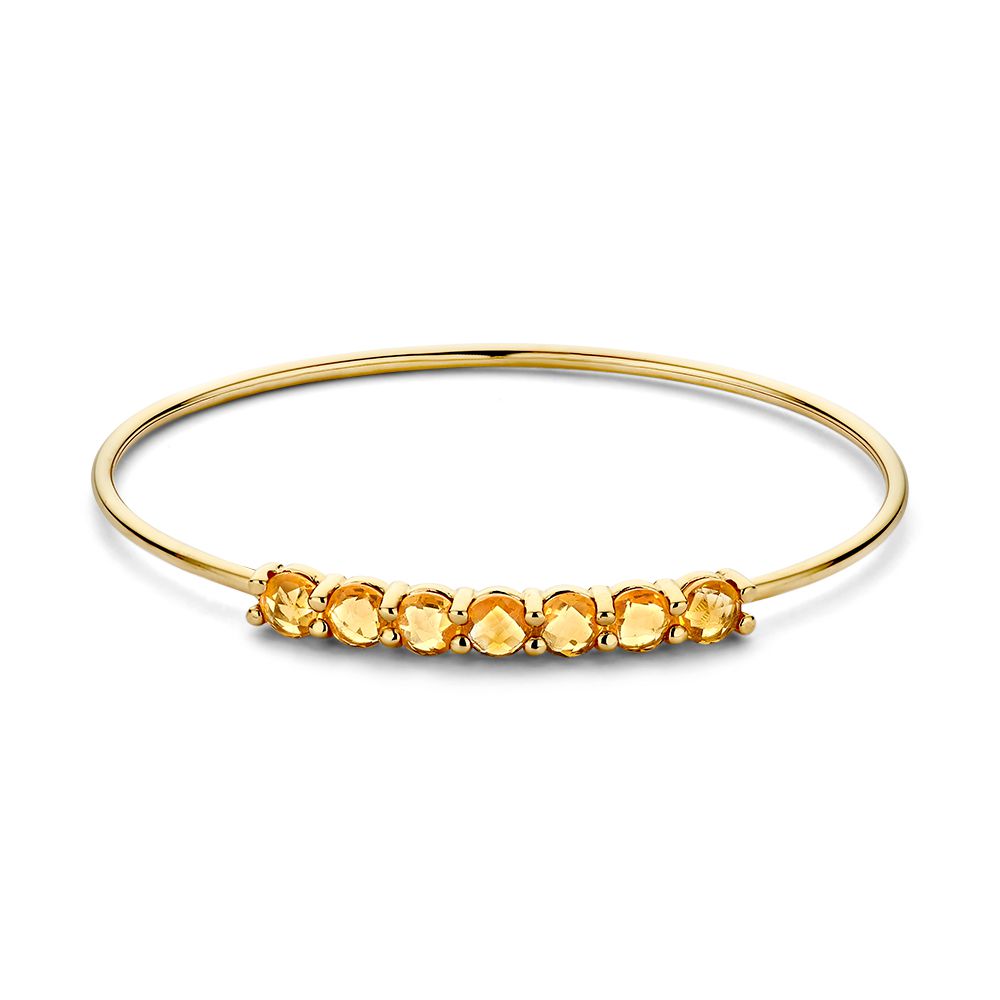 Geelgouden bangle gezet met citrien, een prachtig sieraard met warme uitstraling.
