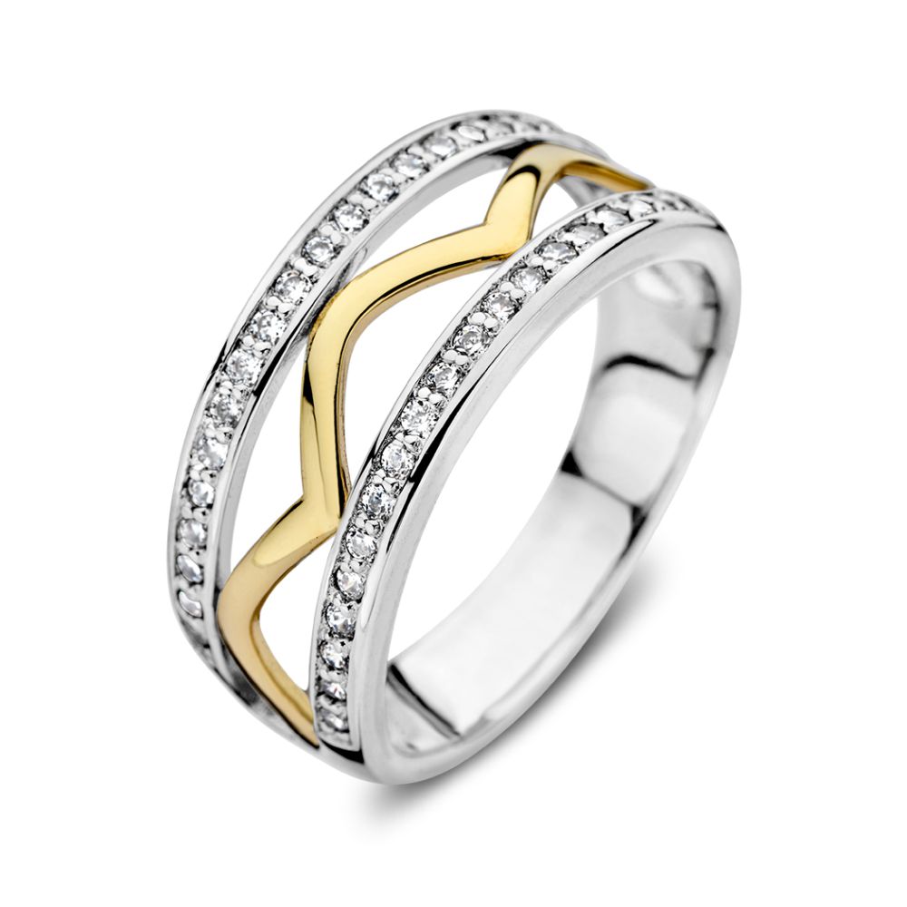 Zilver en 14kt gouden ring (geen oplaag). De zilveren banen van de ring zijn gezet met zirkonia's.
