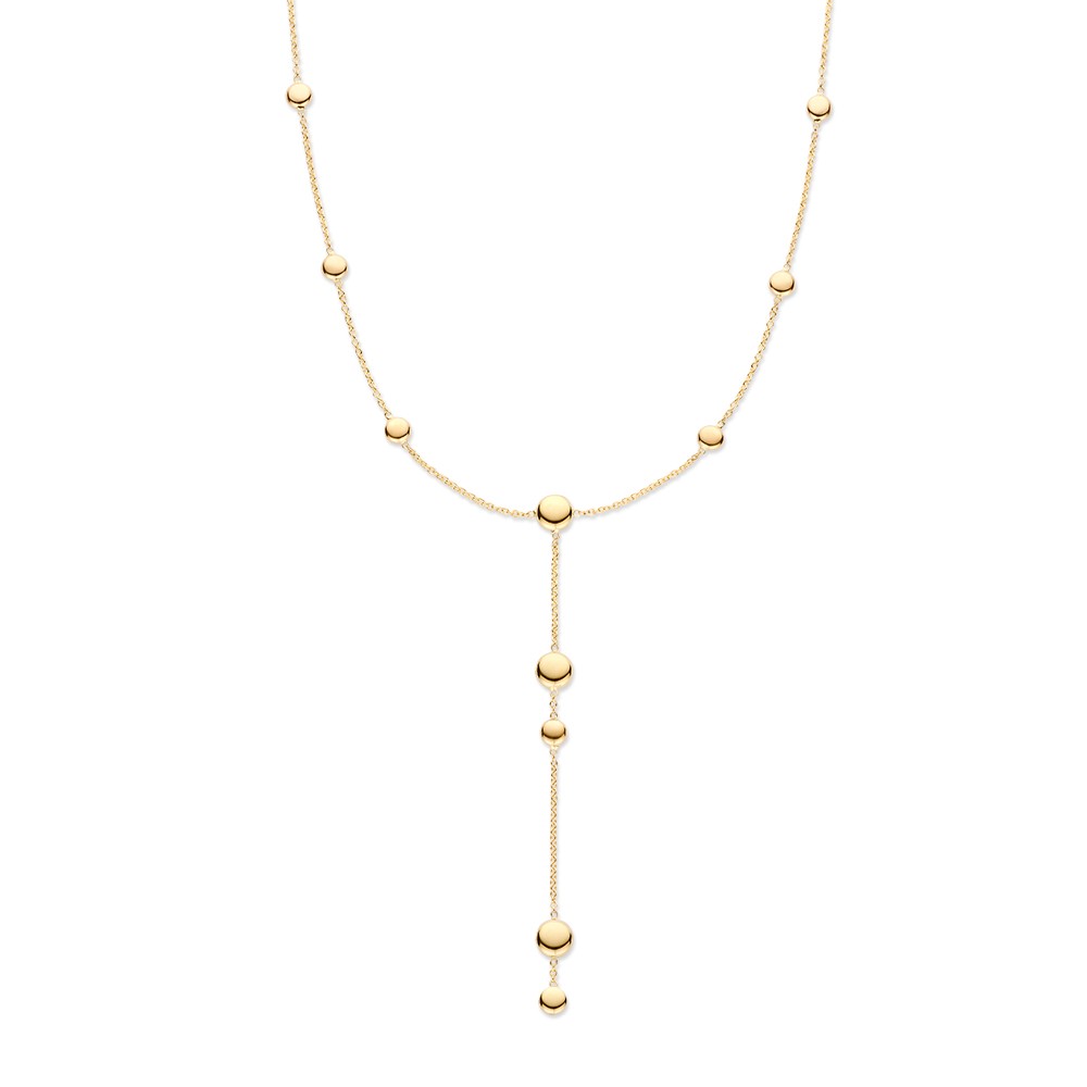 Geelgouden y-collier met gouden pilletjes in verschillende groottes.
