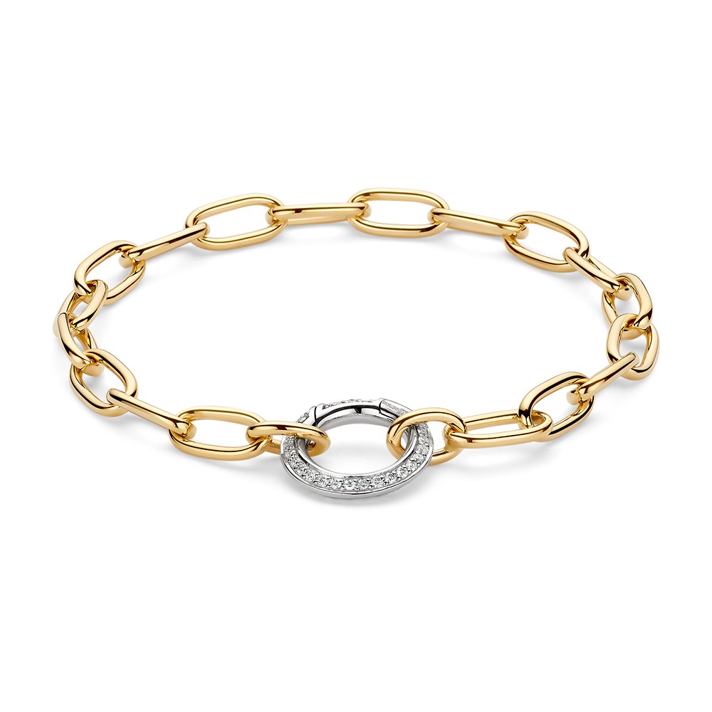 Stijlvolle geelgouden schakelarmband met een opvallend witgouden veerslot gezet met diamanten.
