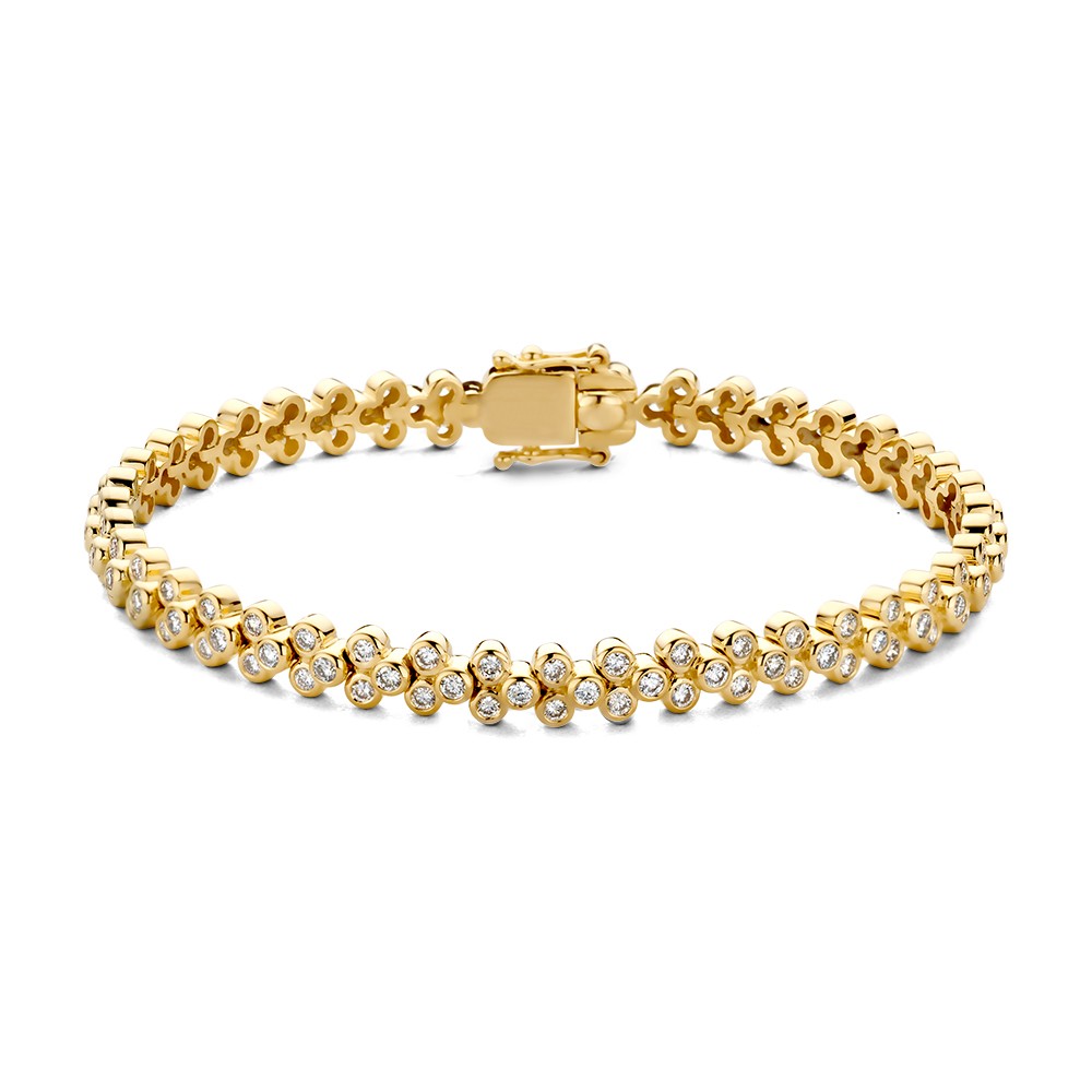 Deze schitterende armband isonderdeel van onze 'Bubbles'-collectie en bevat diamanten in speelse ronde zetkasten.
