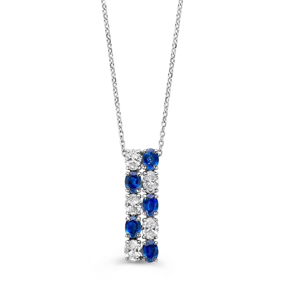 Schitterend witgouden collier met een opvallende hanger gezet met ovale diamanten en blauwe saffieren.
