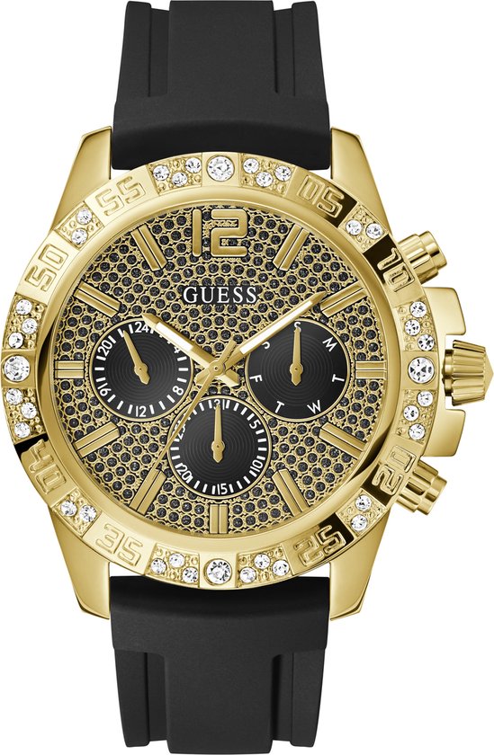 Goudkleurig heren horloge van Guess. Multifunction gezet met kristallen en stoere zwarte siliconen band. Dit horloge combineert elegantie met functionaliteit, perfect voor elke moderne man die graag stijlvol voor de dag komt. De kristallen die rondom de wijzerplaat zijn geplaatst, geven het horloge een luxe uitstraling, terwijl de zwarte multifucntion wijzerplaat zorgt voor een mannelijke en krachtige look.