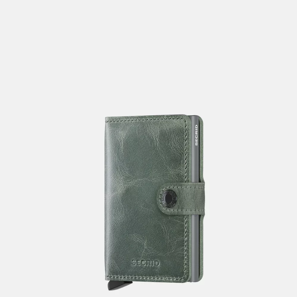 De Secrid Miniwallet Vintage Sage is een veelzijdige accessorize. Het biedt ruimte voor zowel kaarten als brief geld en is perfect voor dagelijks gebruik. Draag het compact in je zak of tas voor ultiem gemak en stijl. Ideaal voor wie functionaliteit en design waardeert.