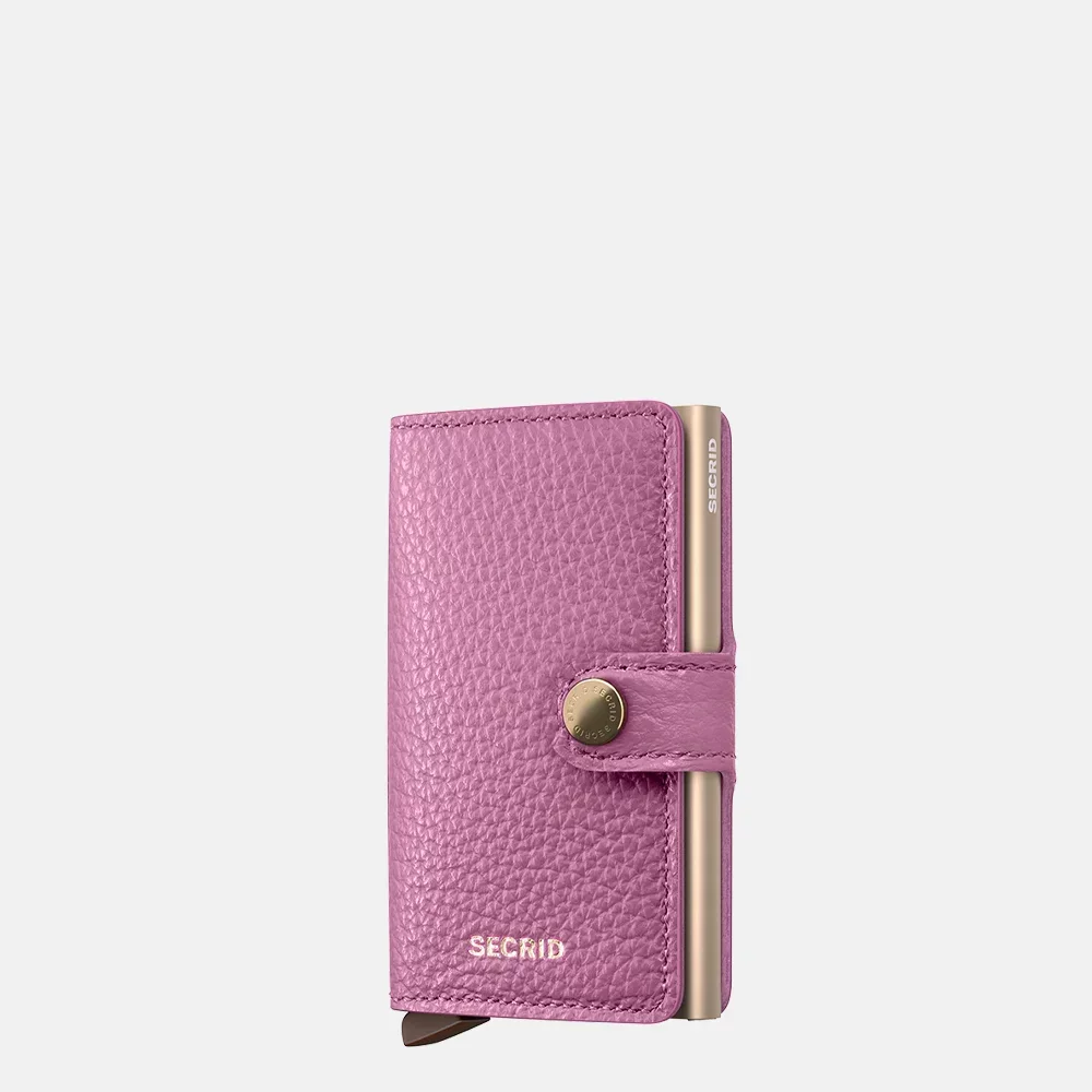 De Secrid Miniwallet in Pebble Orchid biedt een compacte en stijlvolle manier om uw kaarten en contanten veilig te bewaren. Met ruimte voor 4-6 kaarten, papiergeld en extra vakken, is het een ideale metgezel voor dagelijks gebruik. Draag het in uw zak of handtas voor gemakkelijke toegang en ultieme bescherming. Perfect voor elke gelegenheid.