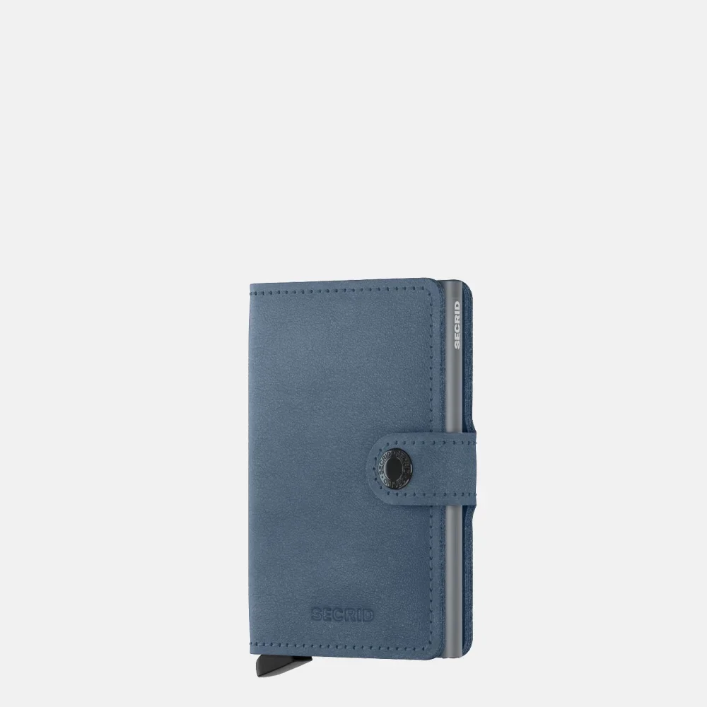 De Secrid Miniwallet in Ice Blue is een stijlvolle accessoire, ideaal voor het veilig opbergen van kaarten en briefgeld. Uitgevoerd in duurzaam leer, biedt het plaats aan meerdere kaarten, bankbiljetten en bonnetjes. Draag het compact in je tas of jaszak voor gemakkelijke toegang. Perfect voor dagelijks gebruik en reizen. 