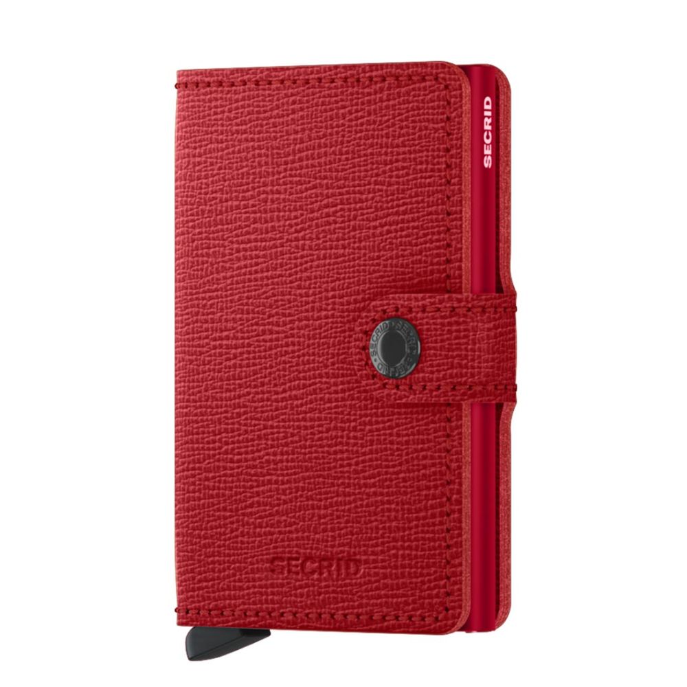 De Secrid Miniwallet | Crisple-Lipstick biedt stijl en functionaliteit in één. Met ruimte voor kaarten, brief geld en bonnetjes, is het de ideale accessoire voor elke dag. Het compacte ontwerp past perfect in je tas of jaszak. Draag het elegant en veilig in je hand of steek het eenvoudig in een zak voor gemak onderweg. 