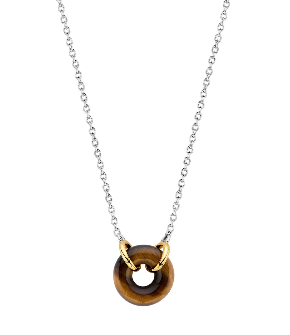 Het pronkstuk van deze TI SENTO zilveren ketting 3971TE is de bruine tiger-eye steen in het midden, omhuld door een verfijnde vergulde zetting. De ronde vorm maakt het een artistiek geheel en de rijke aardse tinten geven de ketting een krachtige look. De ketting is vervaardigd uit 925 sterling zilver. De extra veilige sluiting is speciaal ontworpen zodat het altijd bij je blijft. De lengte van de ketting is 42 cm.