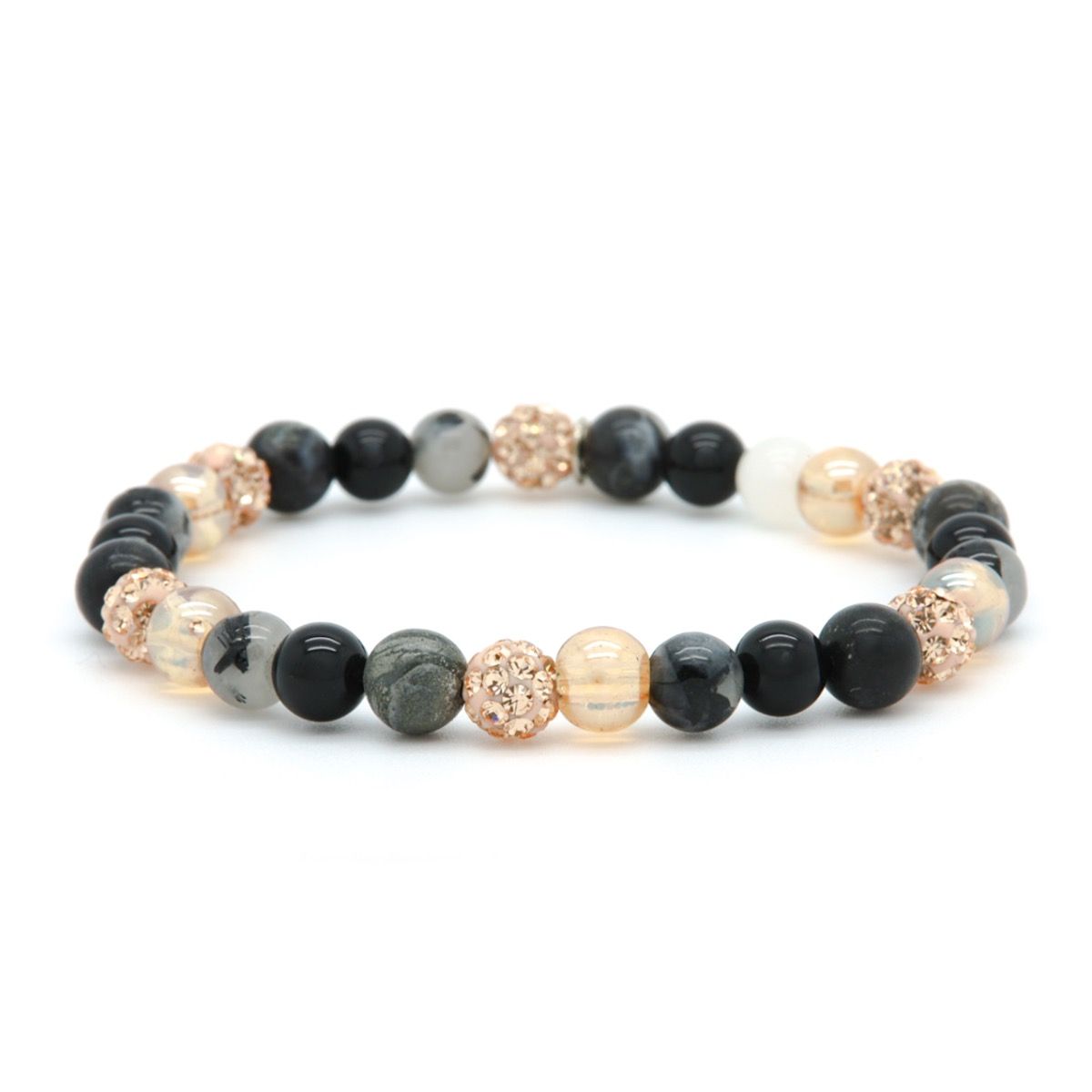 De Karma Armband Spiral Dancing Queen XSin rosegouden kristal is een elegante armband, perfect als sieraad. Het is ontworpen als een spiraalvormige armband die comfortabel rond de pols past. Voor een stijlvolle uitstraling, draag het solo of combineer met andere armbanden. Perfect voor zowel dagelijkse als feestelijke gelegenheden.