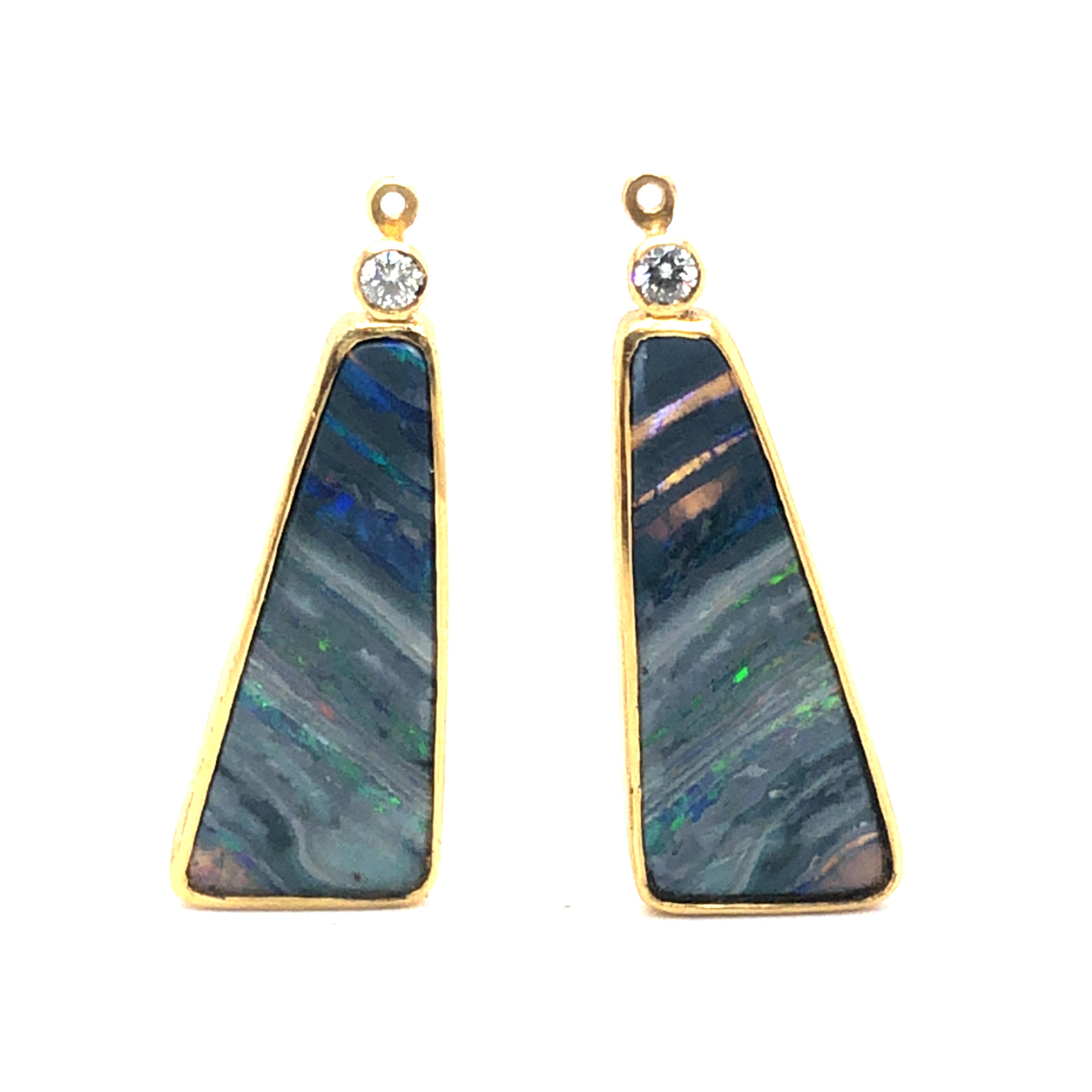 Diese Boulder-Opal- und Diamant-Ohrringe aus Gold sind atemberaubende Schmuckstücke, die Eleganz und Luxus ausstrahlen. Sie lassen sich am besten zu besonderen Anlässen oder als Highlight zu einem eleganten Outfit tragen. Kombinieren Sie diese Ohrringe mit einer Hochsteckfrisur, um den schillernden Opal und die funkelnden Diamanten optimal in Szene zu setzen. Perfekt für stilbewusste Damen!

UNIKATE
sehr schick in Kombination mit Diamantohrsteckern oder schlichten Ohrbügeln
