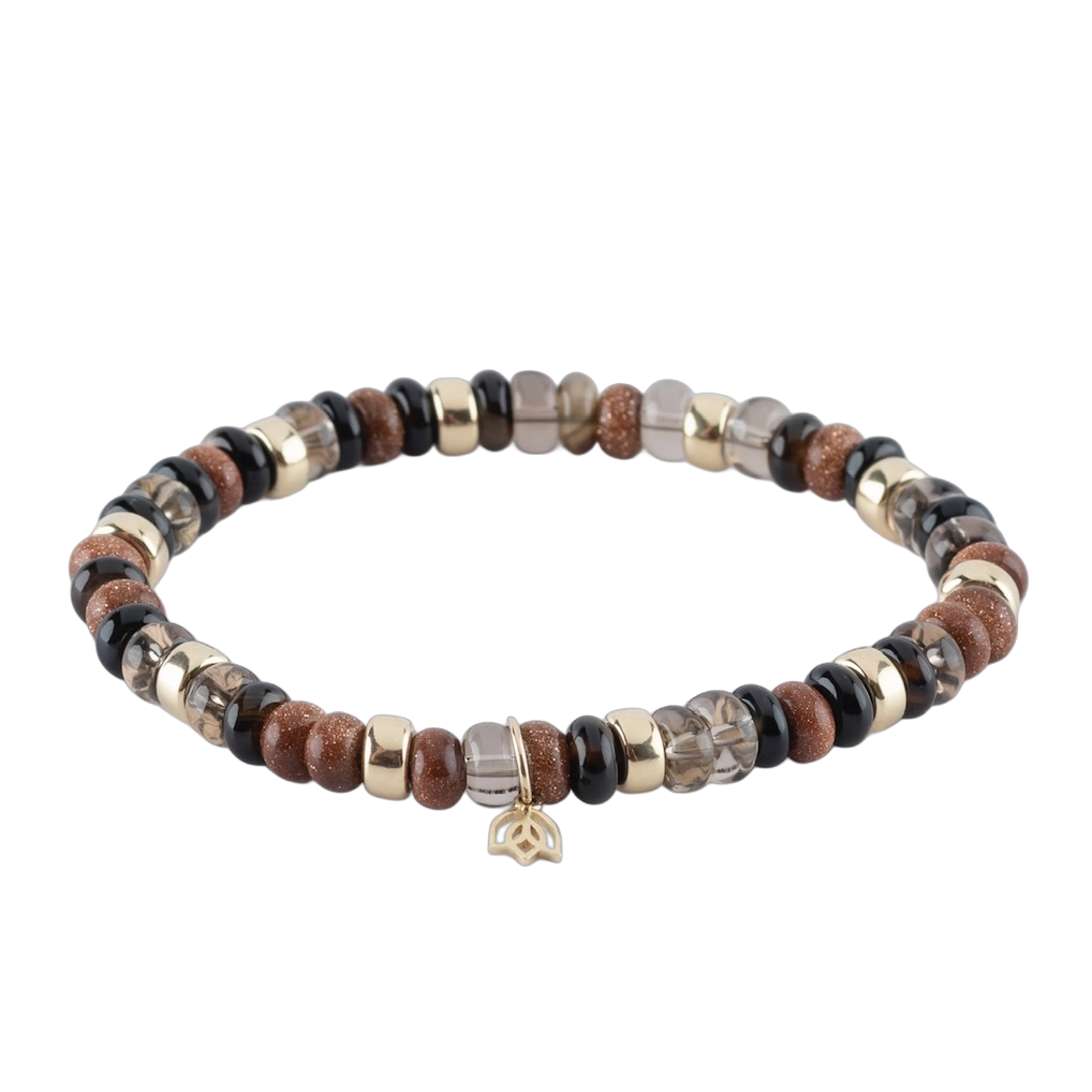 Y&G Edelsteen armband met smokey kwart, tea kwarts, goldstone
Edelstenen armband (6x4mm kralen) en Vijf 14 krt gouden beads & tulp logo.