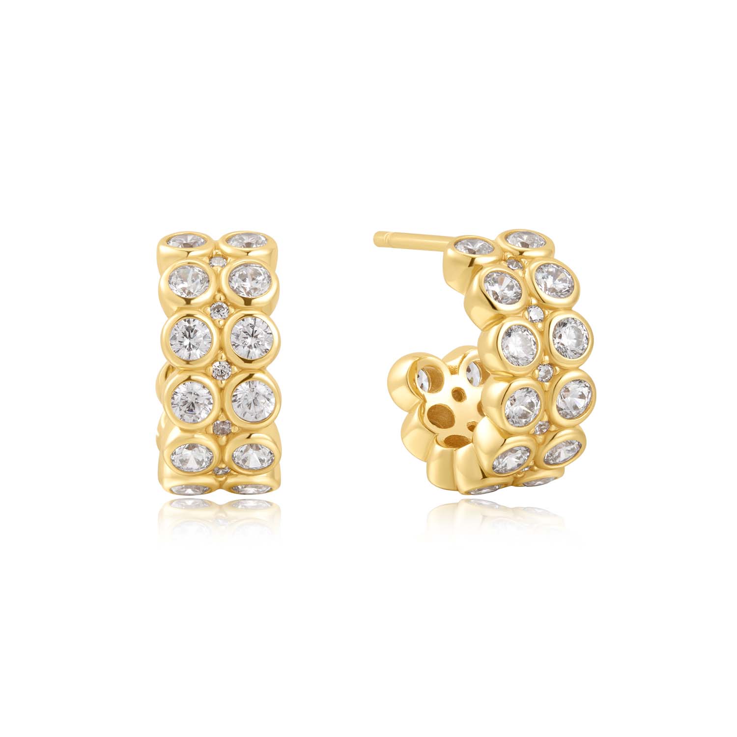 De prachtige oorringen zijn gezet met dubbele rijen glinsterende zirkonia's in 14kt verguld sterlingzilver en maken zeker een statement in elke oorstapel.

HET MERK
GeÃ¯nspireerd door de laatste fashion trends is Ania Haie het toonaangevende sieradenmerk voor hoogkwalitatieve maar ook betaalbare zilveren sieraden, zonder op de kwaliteit in te leveren. Iedere collectie is gebaseerd op de laatste catwalktrends, waardoor Ania Haie snel tot hÃ©t sieradenmerk voor stijlbewuste consumenten is verkozen. Elk sieraad wordt ontworpen om te combineren met andere sieraden waardoor je je eigen look kunt creÃ«ren. Maar ook zijn Ania Haie sieraden opvallend genoeg om op zichzelf te dragen.

SPECIFICATIES
- Ania Haie
- Oorbellen
- 925 zilver met gold/ rhodium plating
- Lengte 8,5mm
- AH E058-04G