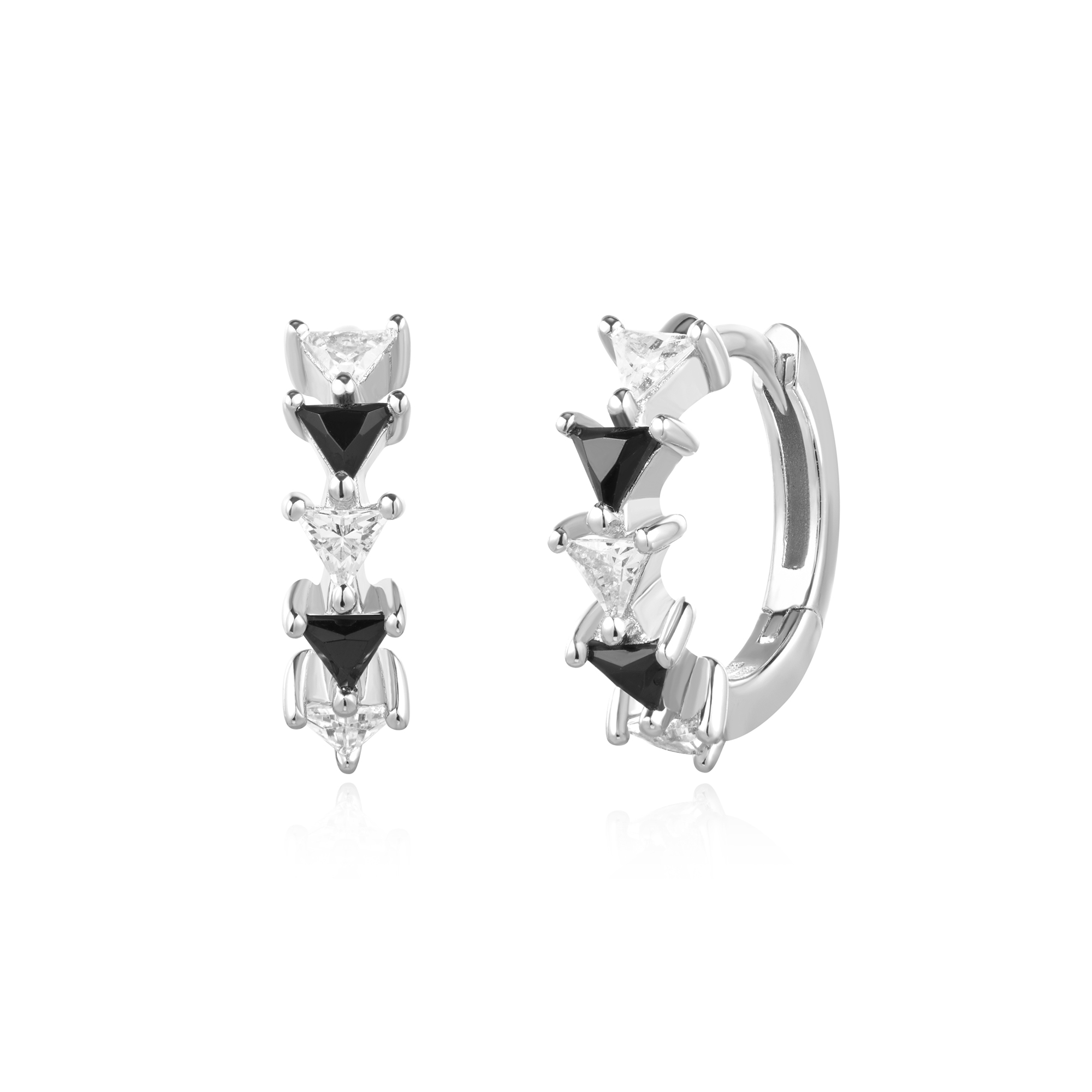 Maak een stijlstatement met deze opvallende oorringen van gerhodineerd sterlingzilver. GeÃ¯nspireerd door Art Deco, zijn deze stukken afgewerkt met zwarte en witte driehoekige kubieke zirkonia. Stapel ze op met andere oorbellen of draag ze alleen, je zult zeker je dagelijkse outfits opwaarderen. 

HET MERK
GeÃ¯nspireerd door de laatste fashion trends is Ania Haie het toonaangevende sieradenmerk voor hoogkwalitatieve maar ook betaalbare zilveren sieraden, zonder op de kwaliteit in te leveren. Iedere collectie is gebaseerd op de laatste catwalktrends, waardoor Ania Haie snel tot hÃ©t sieradenmerk voor stijlbewuste consumenten is verkozen. Elk sieraad wordt ontworpen om te combineren met andere sieraden waardoor je je eigen look kunt creÃ«ren. Maar ook zijn Ania Haie sieraden opvallend genoeg om op zichzelf te dragen.

SPECIFICATIES
- Ania Haie
- Oorbellen
- Lengte 9mm
- 925 zilver met gold/ rhodium plating
- AH E059-13H