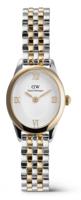 De Ophelia Mini Watch heeft een wijzerplaat met een elegante ovale vorm die afwijkt van traditionele horloges. Dit unieke nieuwe dameshorloge biedt veel vernieuwing. Het wordt geleverd met een nieuw ontworpen beans link band en een vlindersluiting. De iets zwaardere ovale kast benadrukt de elegante silhouet, terwijl de taps toelopende aanzetten zorgen voor een soepele overgang naar de schakelarmband. Het horloge heeft metalen Romeinse cijfers bovenop een schijfpatroon in het midden van de sunray wijzerplaat, en zowel de kast als de armband zijn gepolijst tot een gedurfde, glanzende afwerking.