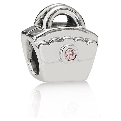 Tasje met roze zirc.