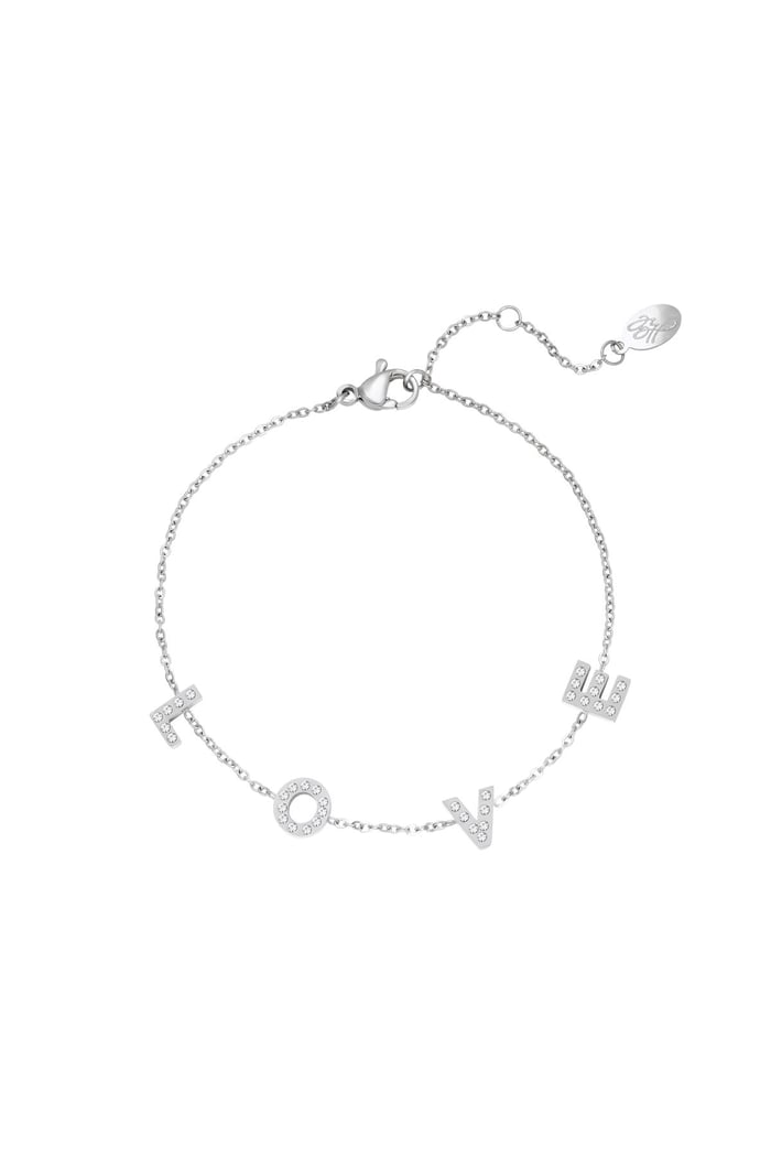 What a lovely bracelet! The bracelet is made of stainless steel and spells the word LOVE. The letters are decorated with white zircon stones. 