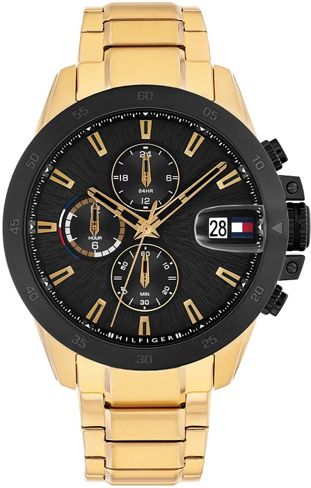 Dit Tommy Hilfiger herenhorloge, modelnummer TH1792199, heeft een stijlvolle gouden metalen kast van 43 mm en een roestvrijstalen band. Het beschikt over een analoge wijzerplaat met zwarte strepen en een datumaanduiding. Waterdicht tot 5 ATM met kwartsuurwerk. Perfect te dragen als elegant en tijdloos accessoire bij zowel formele als casual gelegenheden.