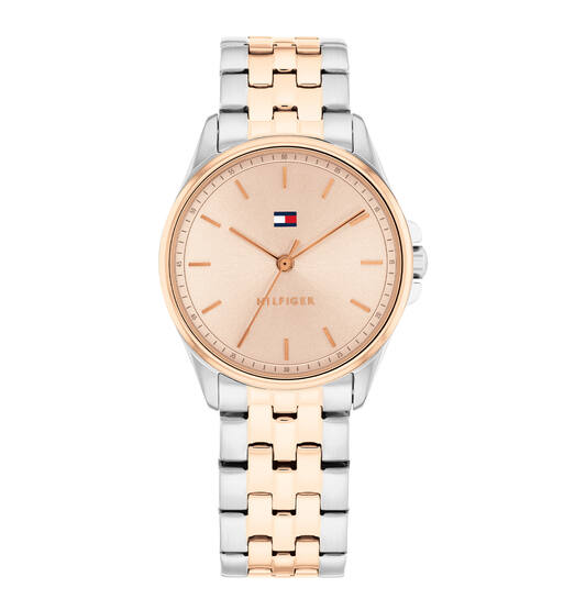 Dit stijlvolle Tommy Hilfiger Jade dameshorloge heeft een bicolor roestvrijstalen kast (30 mm) en een elegante rosékleurige wijzerplaat. De bijpassende bicolor roestvrijstalen band, in zilver- en rosékleur, zorgt voor een luxe uitstraling en comfortabele pasvorm. 