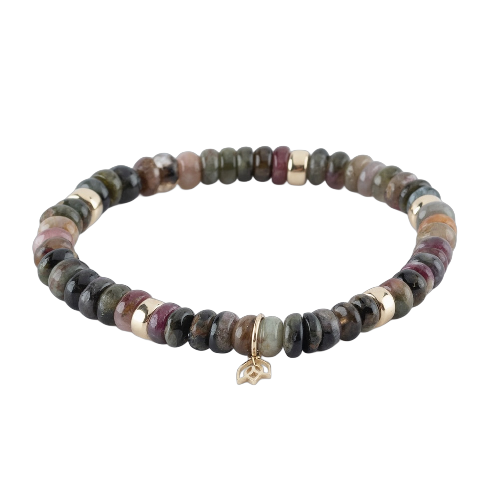 Y&G Edelsteen armband met toermalijn
Edelstenen armband (6x4mm kralen) en Vijf 14 krt gouden beads & tulp logo.