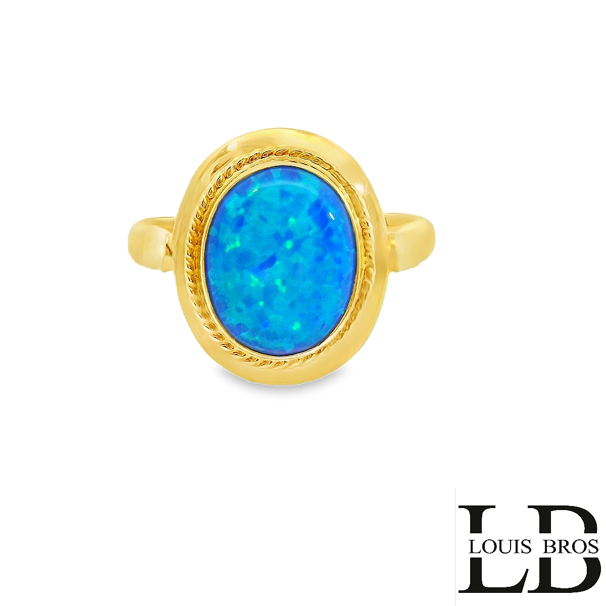 Deze elegante 14 karaat geelgouden ring (2.75 gr) is voorzien van een schitterende ovale synthetische opaal in een diepe blauwe kleur. De steen heeft een prachtige kleurenspel met tinten van blauw en groen, wat zorgt voor een levendige en unieke uitstraling. De opaal is gezet in een verfijnde gladomzetting met een subtiele gedraaide rand, wat extra karakter en luxe aan het ontwerp geeft.

Kenmerken:

Materiaal: 14 karaat geelgoud
Steen: Synthetische opaal, blauw
Vorm steen: Ovaal cabochon
Afwerking: Gepolijst met sierlijke randdetails
Stijl: Klassiek, tijdloos, en elegant

Bijzonderheden:

De ring is perfect als blikvanger voor elke gelegenheid. Of je nu op zoek bent naar een opvallend sieraad voor dagelijks gebruik of een bijzonder cadeau, deze ring combineert klassieke elegantie met een moderne, kleurrijke twist.
De ring is verkrijgbaar in meerdere afmetingen.