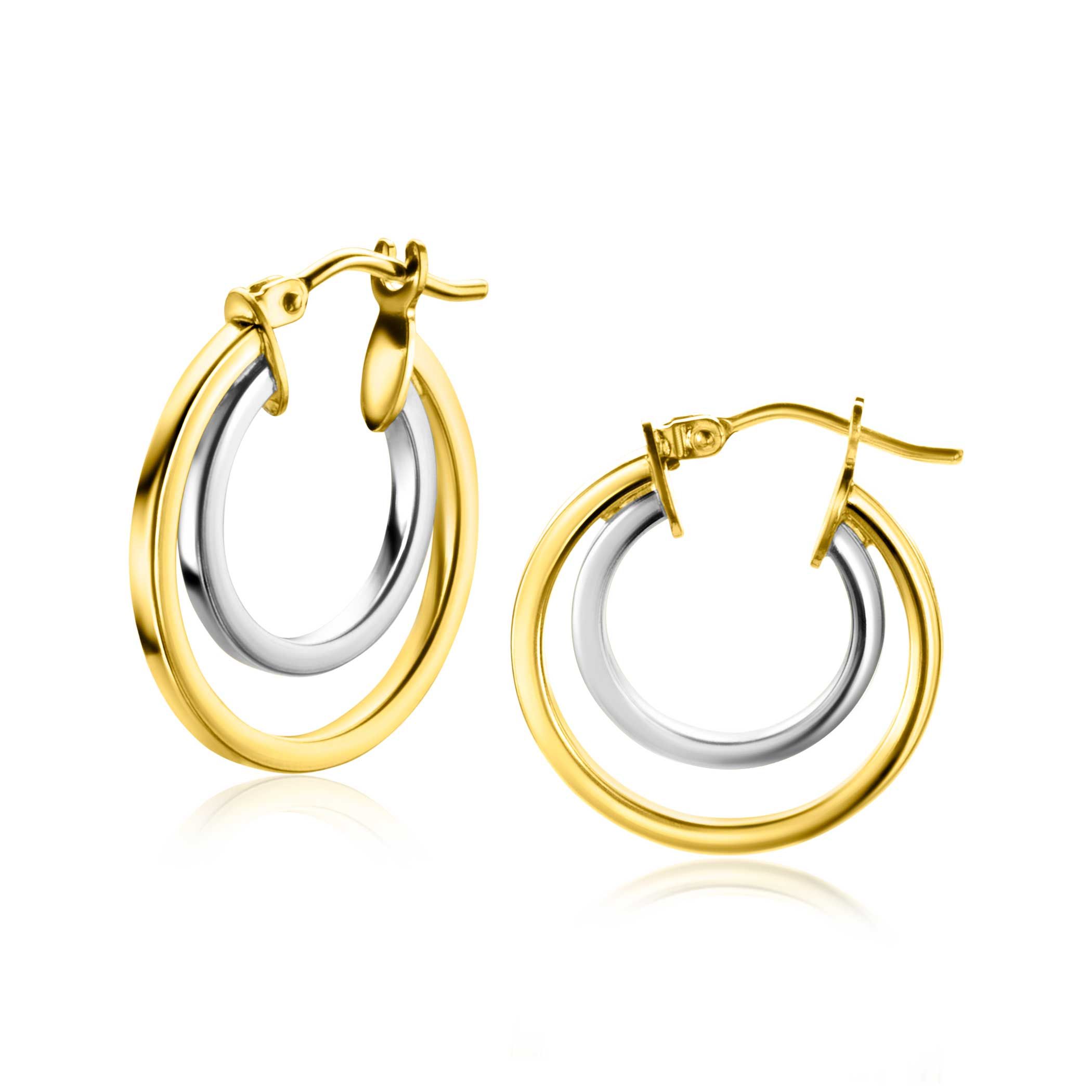 ZINZI Gold 14 karaat gouden oorringen 18mm met trendy witgouden binnenbuis. Hierdoor krijgen deze oorringen een multi-look uitstraling. Met een vierkante buis van 1,5mm breed. Voorzien van een handige bovensluiting. Vervaardigd van geheel 14 karaat goud (585).