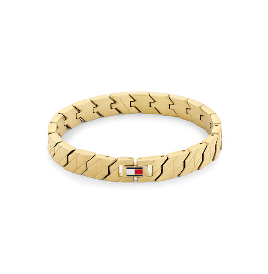 Tommy Hilfiger Jewels TJ2790620 Armband Heren Staal GP 19cm
Deze armband van Tommy Hilfiger uit de jewelry serie Lars met nr: TJ2790620 is een opvallend model. De goudkleurige stalen heren armband heeft grove bewerkte schakels met een opvallende sluiting. Op de sluiting is het gekleurde Tommy vlaggetje van emaille goed zichtbaar. De armband heeft een lengte van 19cm maar is in tekorten of te verlengen door de verwisselbare schakels. Ook leuk te combineren met de bijpassende ring en andere sieraden van Tommy Hilfiger.

Het merk:
Tommy Hilfiger is wereldwijd één van de grootste designer lifestyle merken en is internationaal bekend om haar classic American cool stijl. De sieraden zijn voor dames en heren met een eigen stijl, die niet bang zijn om dit aan de wereld te laten zien.

Specificaties:
- Schakelarmband
- Materiaal: Staal GP
- Lengte 19cm
- Heren sieraad