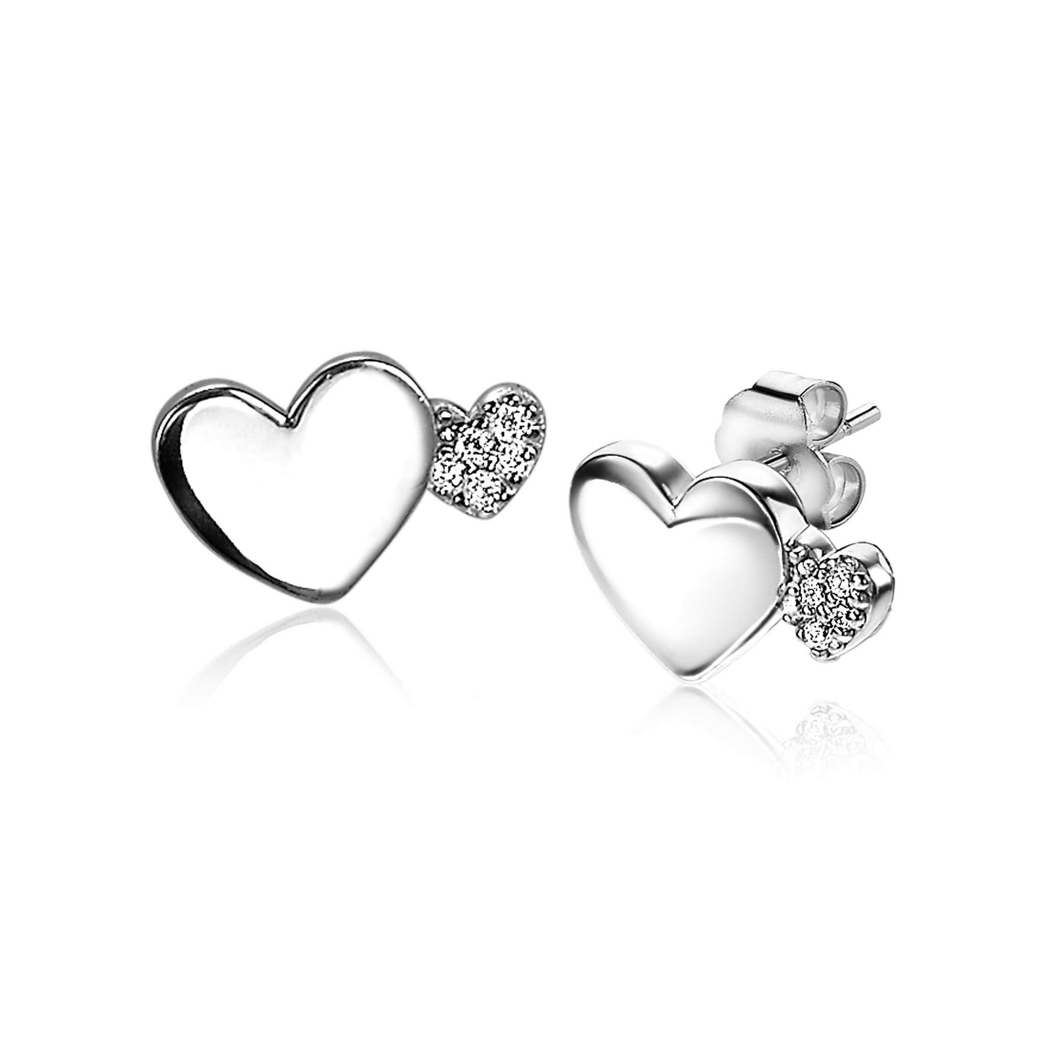 ZINZI zilveren oorknoppen (10mm) met twee hartjes naast elkaar, waarvan de kleinste bezet is met witte zirconia's. Maak je look compleet door deze oorknopjes te combineren met meerdere ZINZI zilveren sieraden! Vervaardigd van eerste gehalte zilver (925) en voorzien van een extra rodiumlaag voor een langdurige glans.
