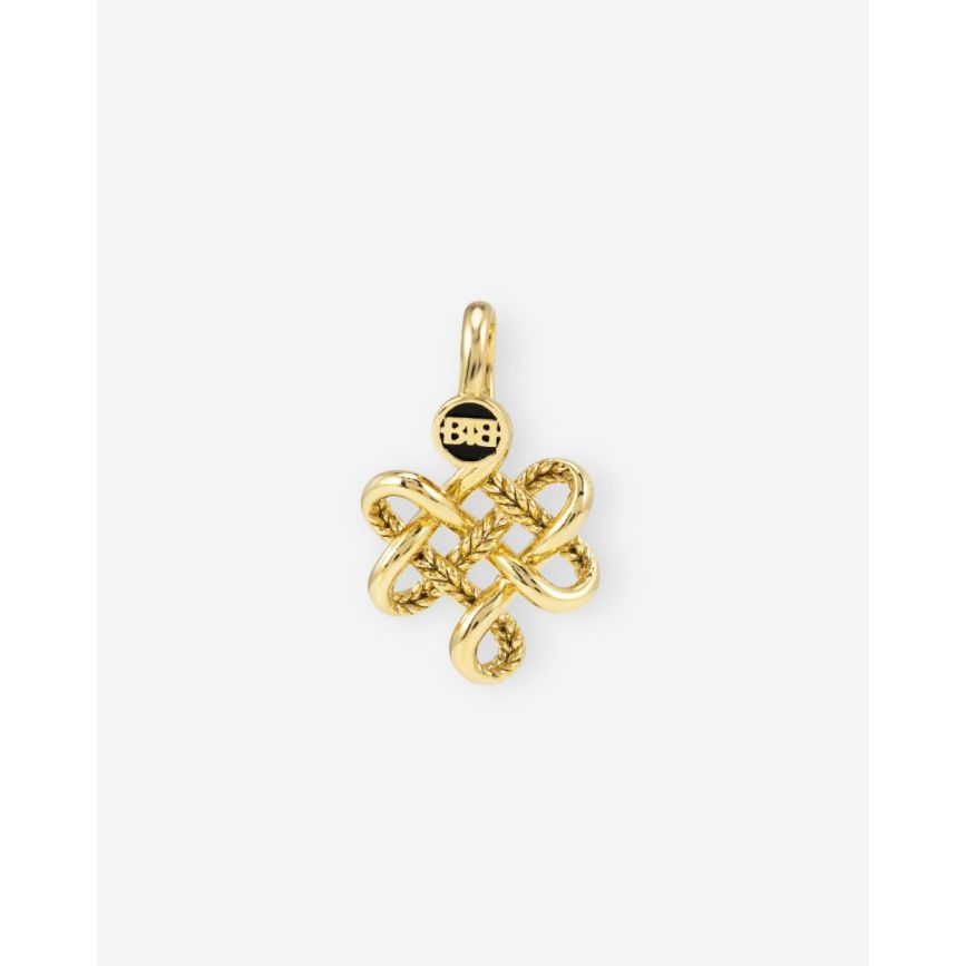 De Endless Knot Hanger XS is een meesterwerk van betekenis en ontwerp. Deze elegante hanger symboliseert een oneindige verbinding. Het tijdloze ontwerp, geïnspireerd door het eeuwenoude symbool van de eindeloze knoop, viert harmonie, continuïteit en oneindigheid. Ontworpen in Amsterdam en handgemaakt in Zuid-Oost Azië van gerecycled zilver met een premium gold plating (3.0 micron dik). De plating is gemiddeld 5 maal dikker dan reguliere gold plated items.