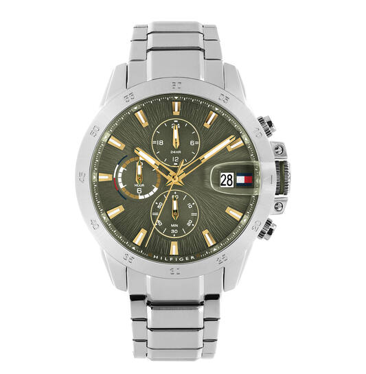 De Tommy Hilfiger horloge model 1792197 is een zilverkleurig, groen herenhorloge van 43 mm, gemaakt van staal. Het is een polshorloge dat elegantie en stijl combineert. Draag dit uurwerk om uw pols voor zowel formele als informele gelegenheden. Het voegt een verfijnde touch toe aan elke outfit en is perfect voor de moderne gentleman.