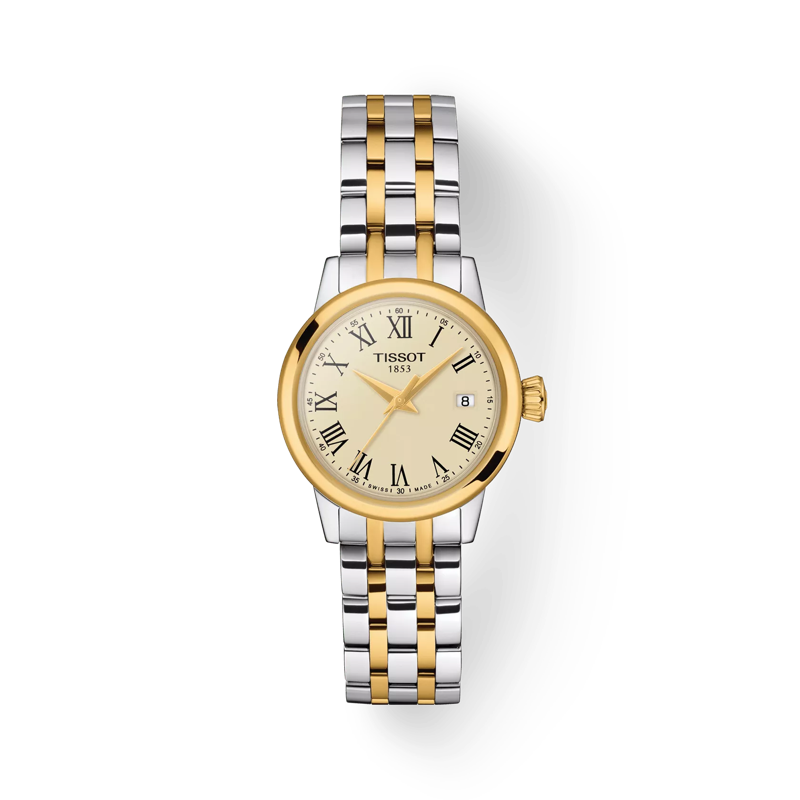 De populaire Tissot Classic Dream-collectie is herzien en heeft een nieuwe uitstraling gekregen. Er is echter niets veranderd in het oorspronkelijke doel om te streven naar het ontwerpen van het ideale klassieke, elegante horloge voor elke dag. De tijdloze stijl maakt dat deze collectie al jarenlang één van onze meest succesvolle is. De Classic Dream heeft een Swiss Made Quartz-uurwerk. De wijzerplaat met datumaanduiding en Romeinse cijfers geven het horloge een klassieke uitstraling. Dit damesmodel heeft een bi-colour kast van edelstaal met deels goudkleurige PVD-coating gecombineerd met een ivoorkleurige wijzerplaat. De bi-colour edelstalen horlogeband sluit middels een vlindersluiting met twee drukknoppen.