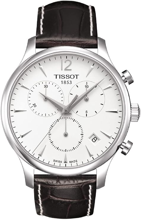 De Tissot Tradition T0636171603700 is een elegante polshorloge met een roestvrijstalen kast en een kastgrootte van 42 mm. Het beschikt over een datumfunctie en een bruine leren band. Deze klassieke horloge combineert perfect met formele en semi-formele outfits, ideaal voor zakelijke bijeenkomsten of speciale gelegenheden. Draag dit horloge om elegantie en stijl toe te voegen aan elke look.
