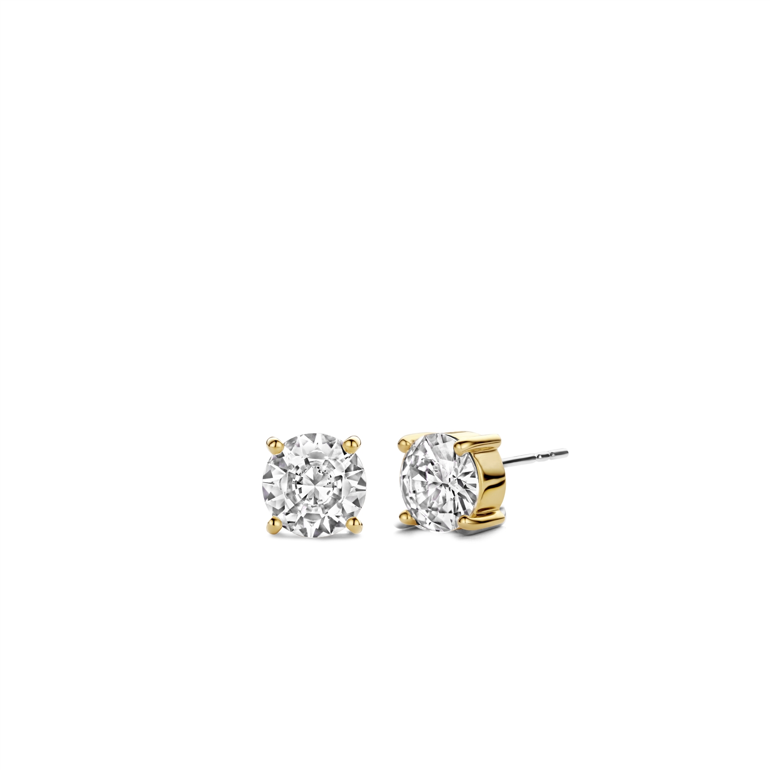 Deze vergulde TI SENTO oorbellen 7319ZY zijn ontworpen om je lach te doen stralen. Elke oorknopje heeft een glanzende witte zirkonia in een stralende setting. Zorgvuldig vervaardigd met premium 925 sterling zilver en verguld voor een maximale uitstraling, zijn deze knopjes de perfecte mix van tijdloze stijl en moderne charme. Het contrast tussen de oogverblindende zirkonia en de warme gloed van de zetting creëert een opvallend contrast dat bij elke outfit past. Draag ze alleen voor een minimalistische look of combineer ze met andere oorbellen om je eigen Ear Party te creëren. Verrijk moeiteloos uw alledaagse look met hun tijdloze allure en maak een glamoureus statement. Net als al onze sieraden zijn deze oorbellen nikkelvrij en hypoallergeen, waardoor ze niet alleen stijlvol zijn, maar ook comfortabel en van hoge kwaliteit.