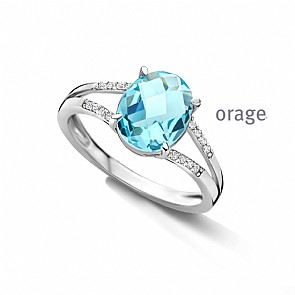 Zilveren ring met zirkoon en blauwe kleursteen