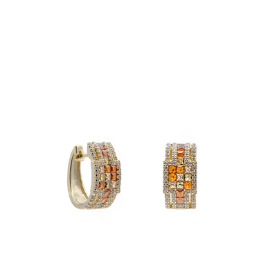 Hoop earrings with stones in warm orange tones. Immerse yourself in radiant warmth with our hoop earrings, adorned with multiple stones in orange tones. This jewelry exudes the energy of the sun, enveloping your ears in a warm, vibrant glow. The hoop design adds a contemporary touch to this explosion of warm hues, making these earrings a bold expression of style and vibrancy, perfect for brightening any occasion with their sunny charm.