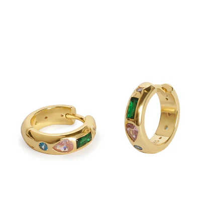 A pair of elegant, gold-plated silver hoop earrings with a modern design, adorned with precious stones of various colors and shapes. Each earring features an asymmetrical setting with rectangular-cut emeralds, blue-toned sapphires, and pinkish teardrop gemstones. The shiny gold finish enhances the color contrast, creating a sophisticated and eye-catching piece, ideal for those seeking a unique and distinctive accessory.