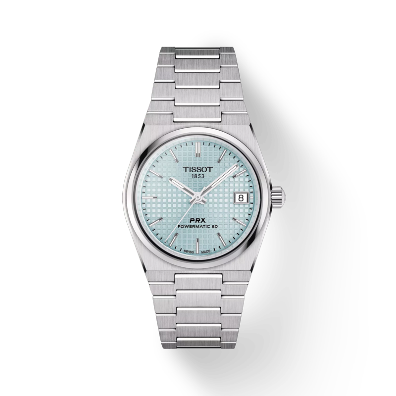 De Tissot PRX Powermatic 80 35mm, biedt elegante kenmerken zoals een roestvrijstalen kast en zilverkleurige armband. Met datumaanduiding is het functioneel en stijlvol. Draag deze horloge om uw pols als een statement van verfijning en tijdloze klasse. Perfect voor zowel formele als casual gelegenheden.