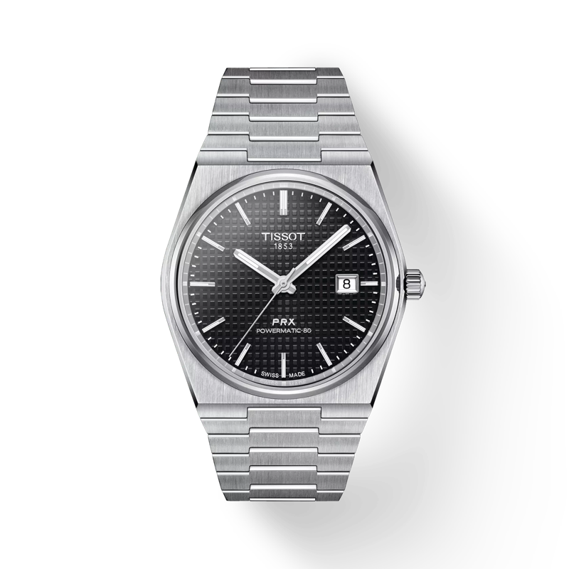  In 2021 presenteerde Tissot de PRX 40 205, met de nummers onder vermelding van het productnummer dat het horloge destijds droeg. Het is een moderne versie van het vorige model. De 316L roestvrijstalen kast van de Tissot PRX 40 205 heeft een diameter van 40 mm. Het heeft een lichte tonneau-vorm en is versierd met een smalle, ronde ring. Aan de zijkanten wisselen verticaal geborstelde, afgeronde afwerkingen af met gepolijste facetten. De Tissot PRX 40 205 Powermatic 80 is uitgerust met een wijzerplaat met een honingraatmotief in combinatie met vernikkelde indexen en wijzers. 